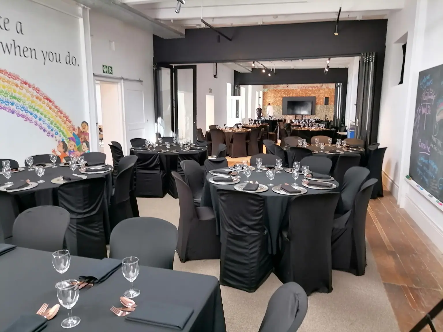 Formal corporate event venue prepared for guests